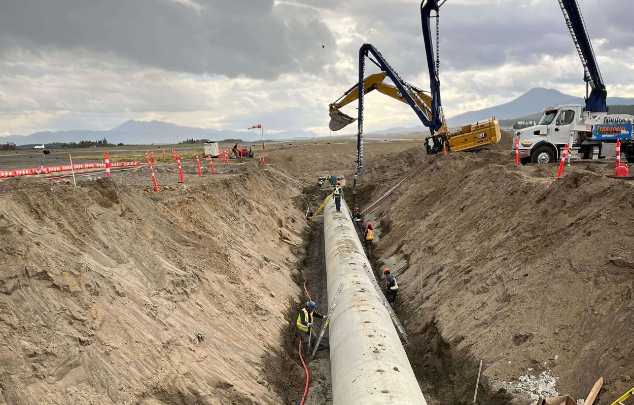 Work to improve drainage pipes at the Erik Nielsen Whitehorse International Airport.