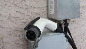 Level 2 charger on stucco wall Level 2 charger on stucco wall
