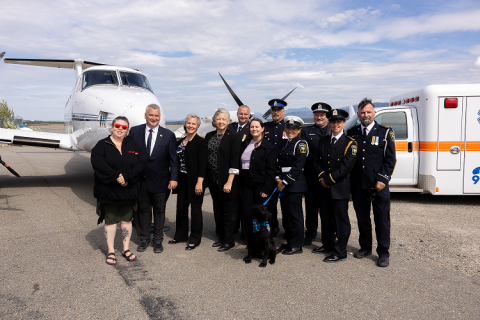 Group of people on an airport tarmac